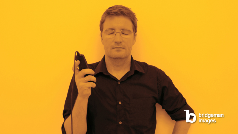 photo of artist Eliasson with yellow background