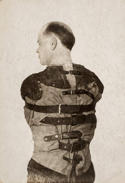 vintage photo of a Mental Patient in Straight Jacket, c.1890 (silver gelatin print) / Private Collection / The Burns Archive and Museum of Historical Photography / Bridgeman Images