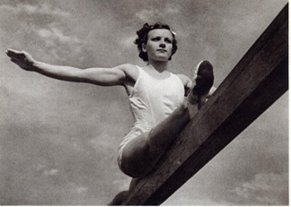 Gymnast on the balance beam, Olympic Games 1936, printed by Deutschen Verlag, 1937 by Leni  Riefenstahl (1902-2003)