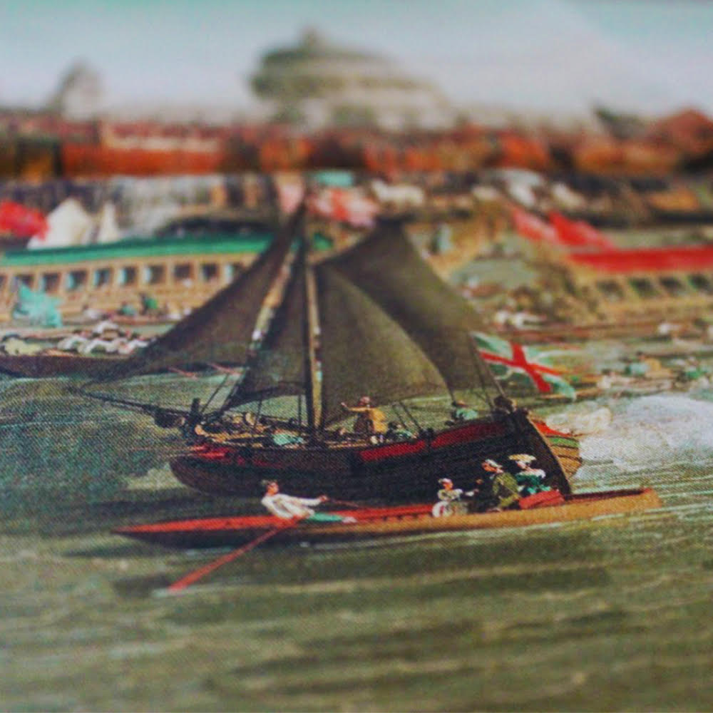 close up detail of the pocket scarf showing the painting by Canaletto